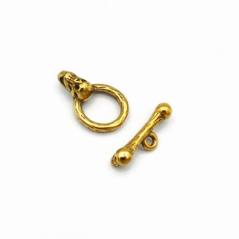 1 Gold Tone Stainless Steel Skull & Bone Toggle Clasp Set